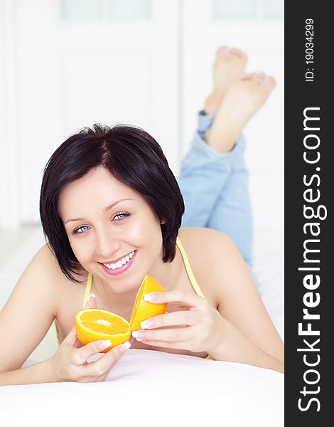 Girl with Orange on a light background