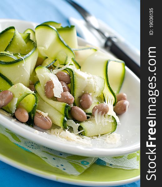 Bean and fresh zucchini appetizer with cheese