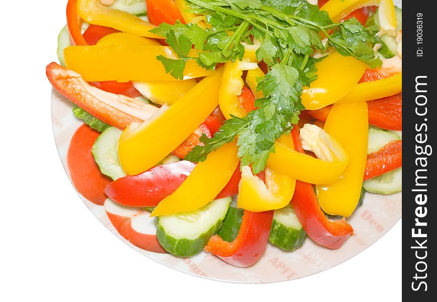 Salad with red and yellow paprikas and cucumber. Salad with red and yellow paprikas and cucumber