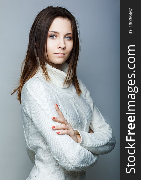 Portrait of a beautiful female model on white background