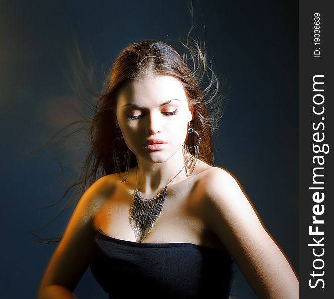 Beautiful lady with long brown hair. Portrait