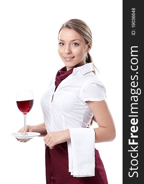 Attractive young girl with a glass of wine on a white background. Attractive young girl with a glass of wine on a white background