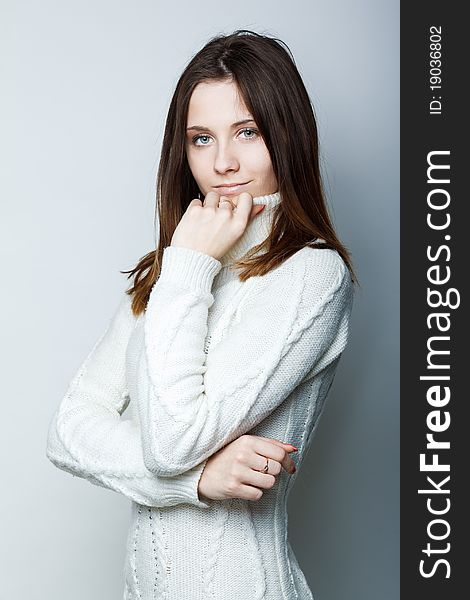 Portrait of a beautiful female model on white background