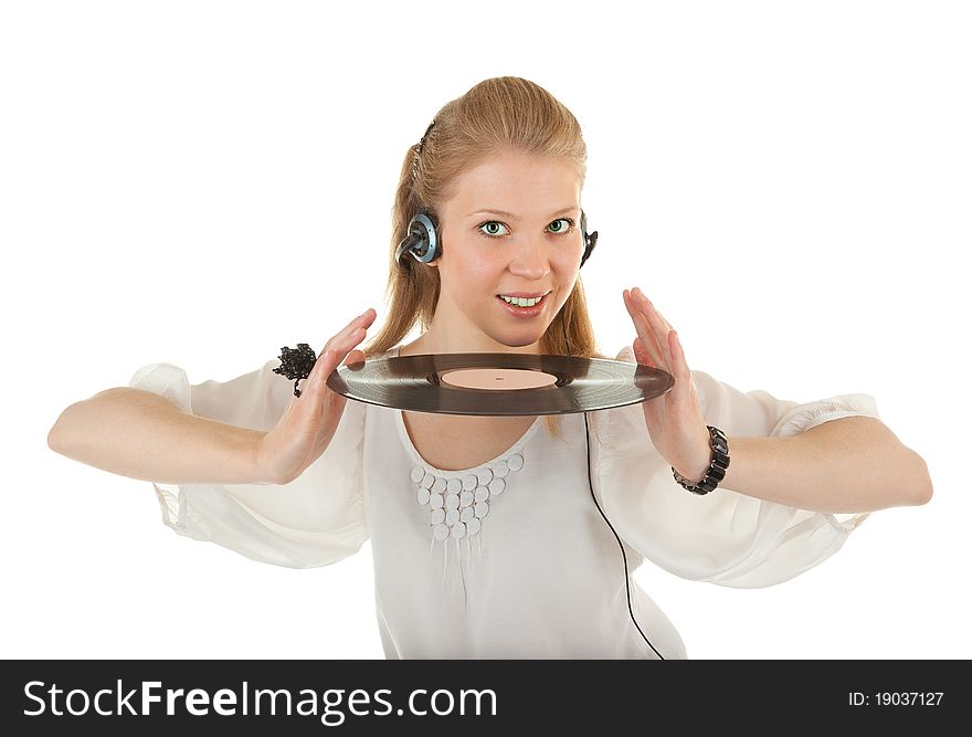 Young girl with a vinyl record and headphones. Young girl with a vinyl record and headphones