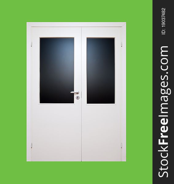 White closed door isoleted on green background (clipping path). White closed door isoleted on green background (clipping path)