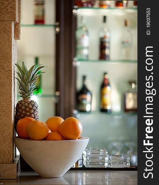 Pineapple and oranges on the bar