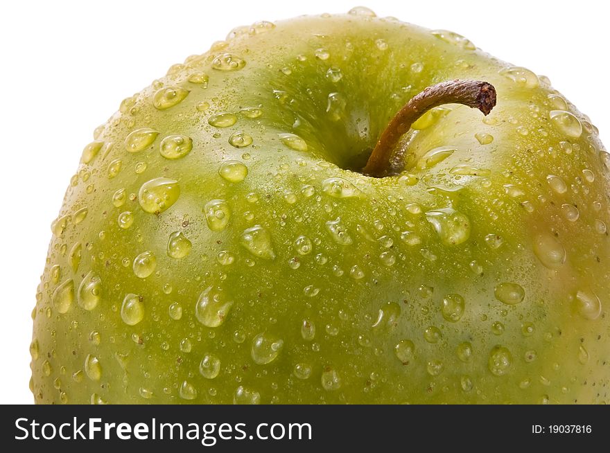 Isolated wet apple (granny smith)