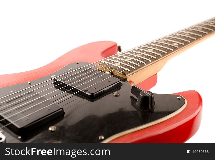 Red guitar isolated on white