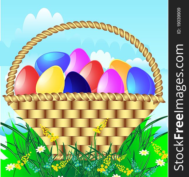 Easter basket with colored eggs on meadow. Easter basket with colored eggs on meadow