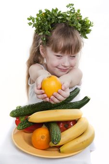 Child Holds Vegetables And Fruit. Stock Images Child Holds Vegetables And Fruit. Stock Images