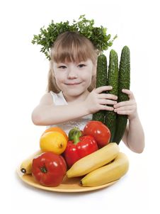Child Holds Vegetables And Fruit. Stock Image Child Holds Vegetables And Fruit. Stock Image