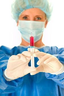 Woman Surgeon Holding A Syringe Stock Photography Woman Surgeon Holding A Syringe Stock Photography