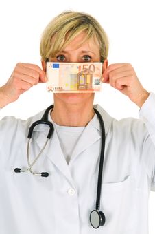 Female Doctor Holding Banknotes Royalty Free Stock Photos