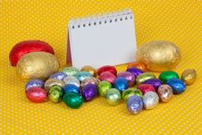 Blank Notebook With Easter Chocolate Eggs. Stock Photo Blank Notebook With Easter Chocolate Eggs. Stock Photo