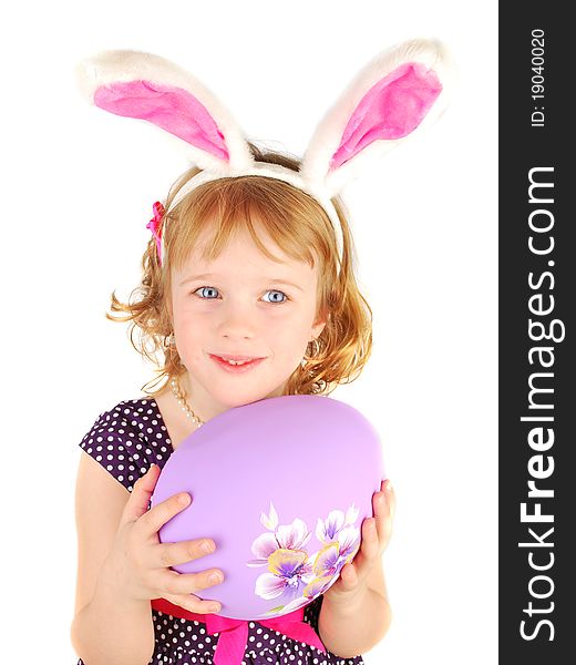 Portrait of a happy little rabbit girl with big Easter egg isolated on the white background. Portrait of a happy little rabbit girl with big Easter egg isolated on the white background.