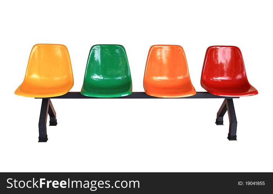 Thermoset plastic seat with four different colors supported with iron stand, isolated on white background. Thermoset plastic seat with four different colors supported with iron stand, isolated on white background