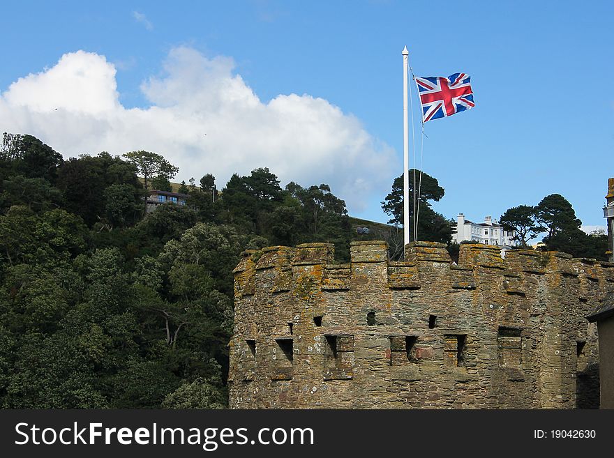 British flag in the tower of an old castle in Devon, in the south of England