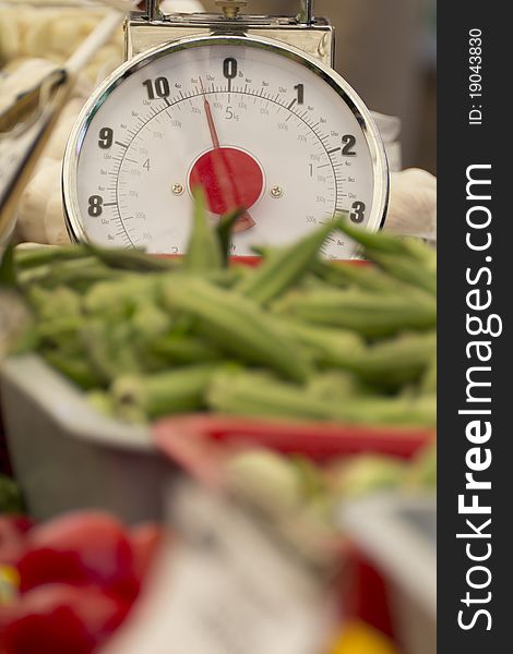 Close up on a kitchen scale on a street market's table.