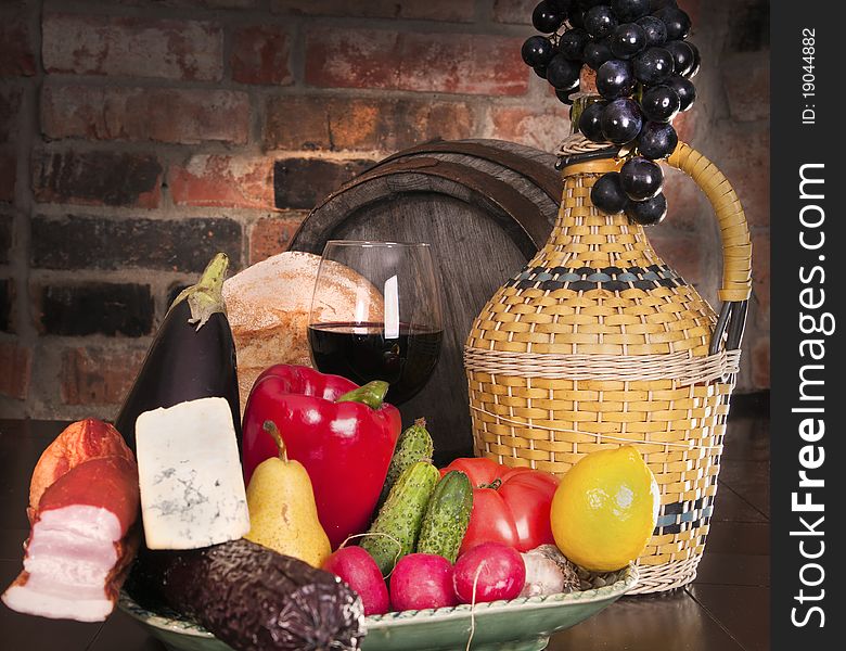 Still life with wine and some fruits