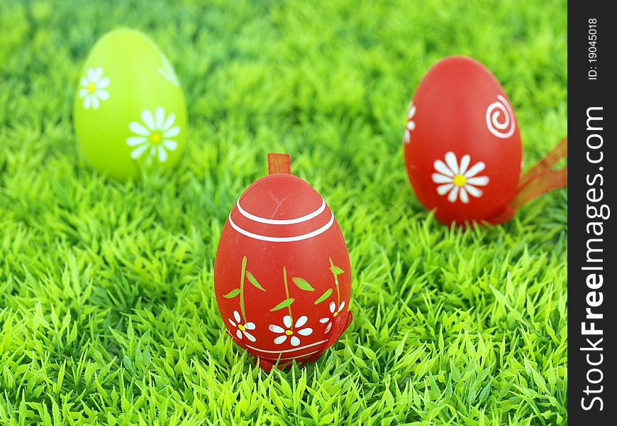 Colorful Easter eggs on the grass