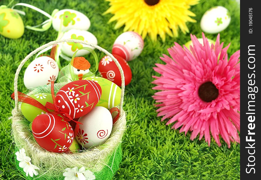 Spring Flowers And Colorful Easter Eggs