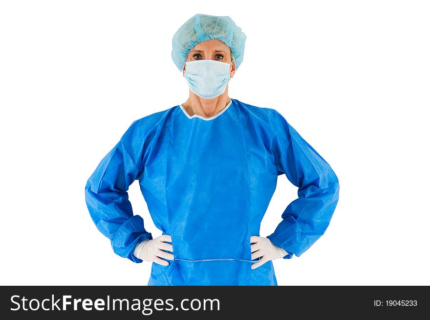 Female surgeon standing with coat