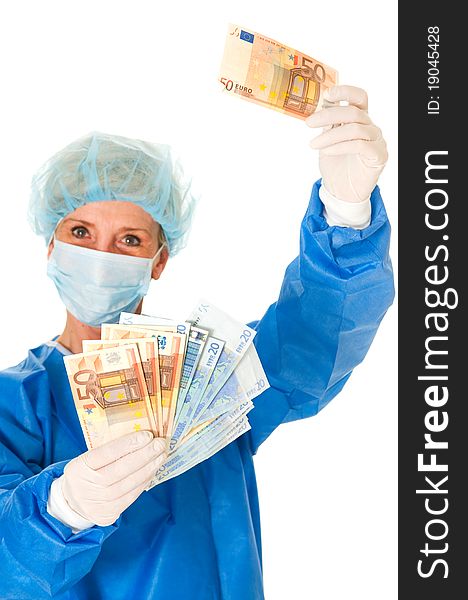 Female surgeon holding banknotes