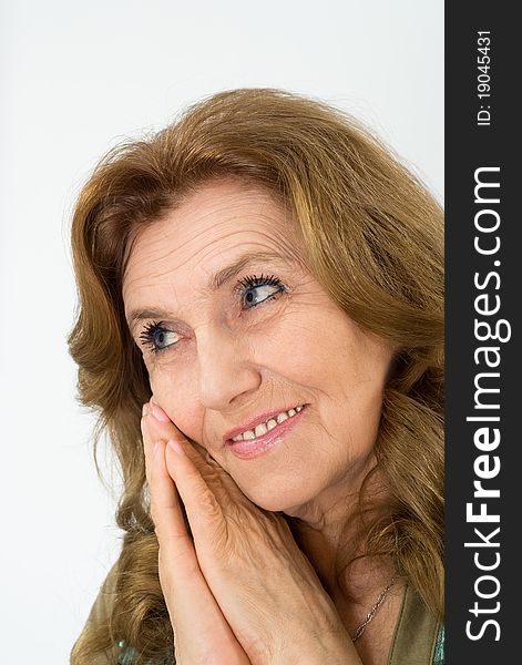 Nice elderly woman on a blue background