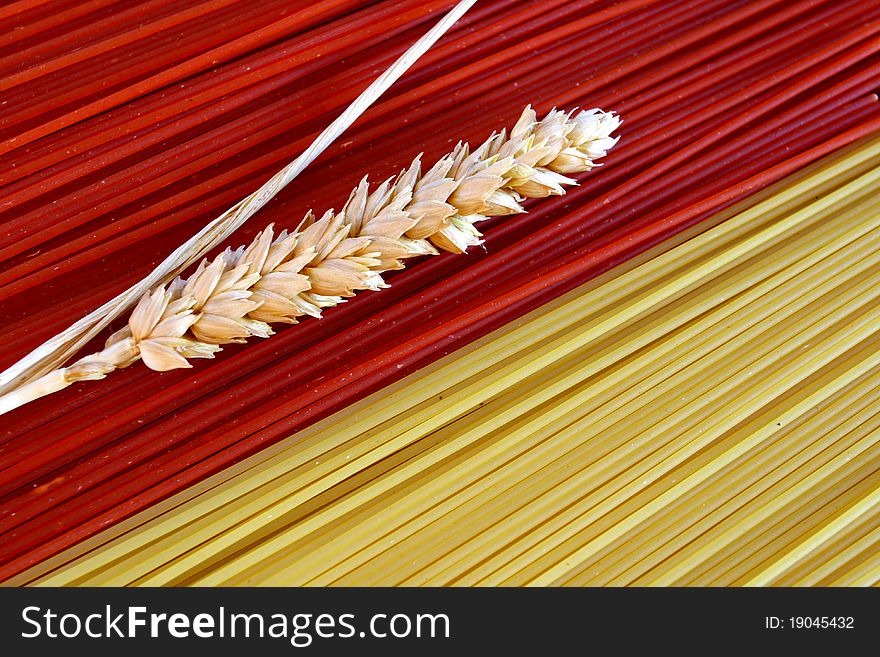 Spaghetti and  an ear of wheat