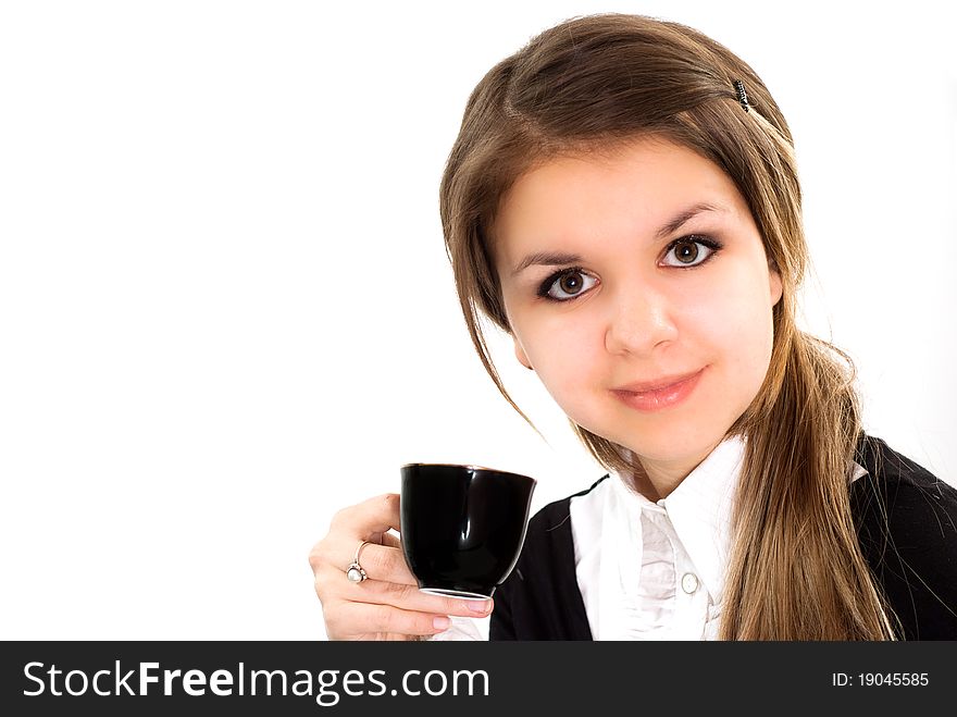 Beautiful woman drink in a black business suit with a white