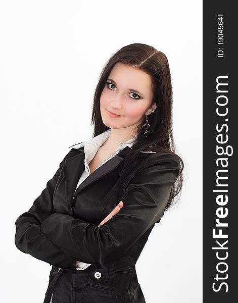 Beautiful woman in a black business suit with a white