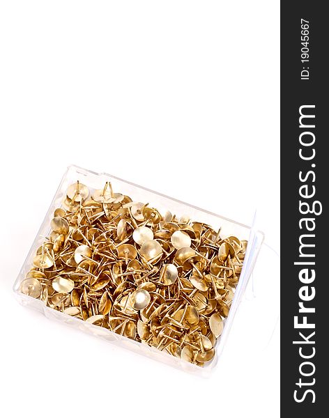 Golden Thumb Tacks In Container