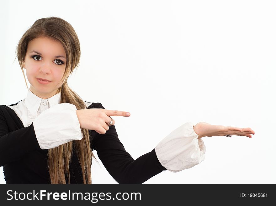 Beautiful woman in a black business suit with a white