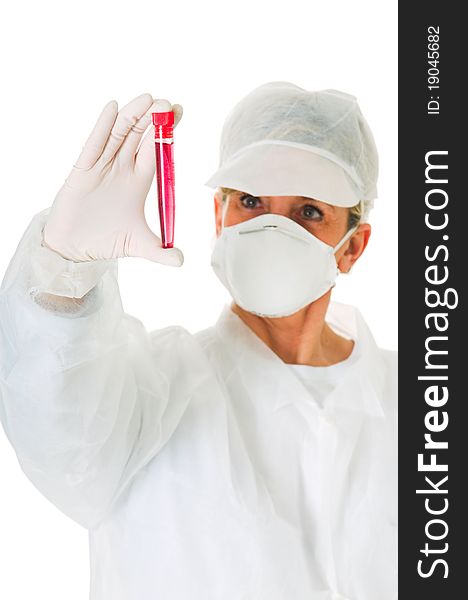 Female doctor with mask holding a test tube in white background