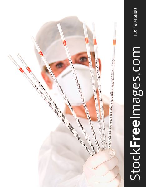 Doctor with mask holding sticks in white background