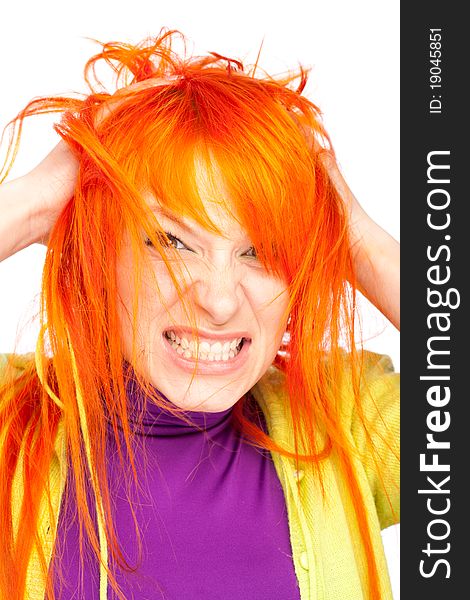 Angry woman holding red head with hands show teeth
