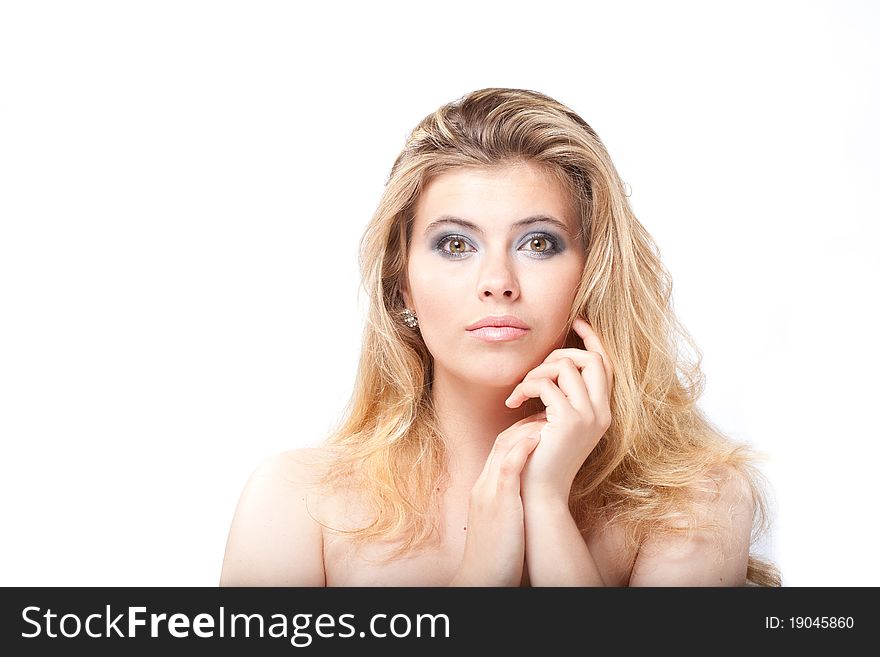 Beautiful young woman looking at camera