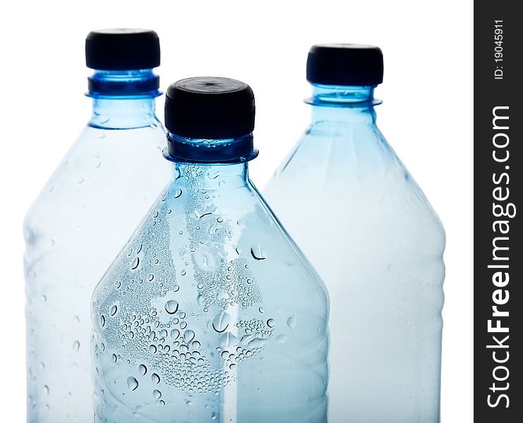 Simple plastic bottles on white