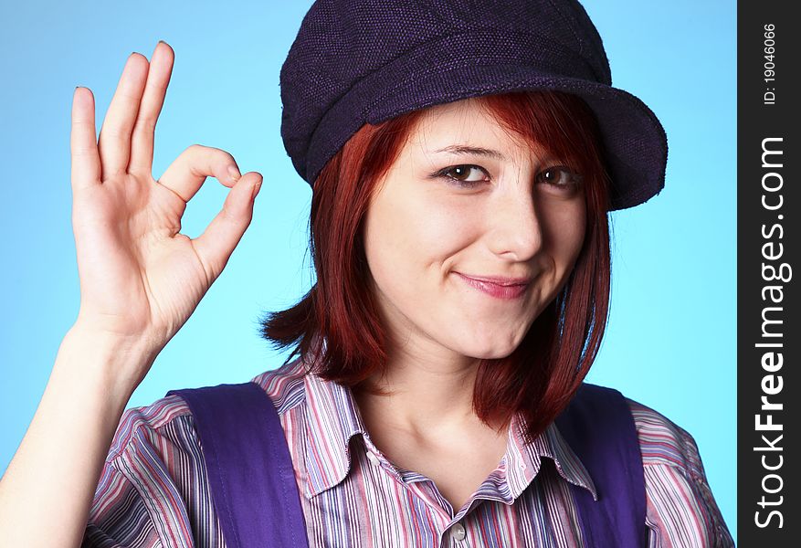 Beautiful Girl In Shirt And Violet Cap Show OK