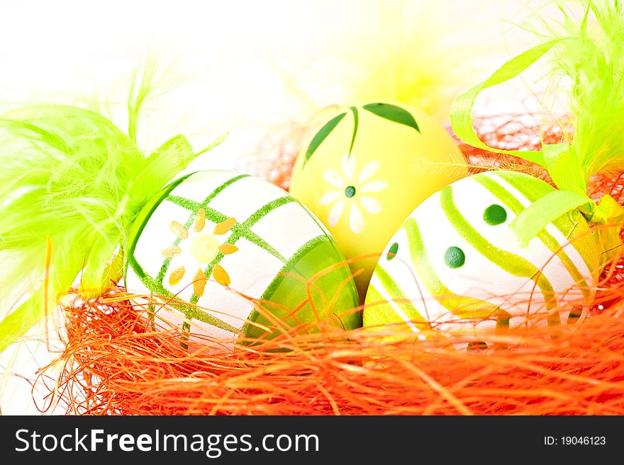 Painted eggs on orange background. Painted eggs on orange background.