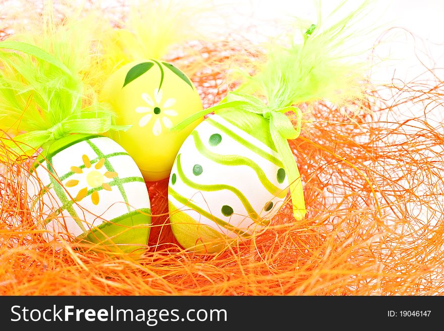 Painted eggs on orange background. Painted eggs on orange background.