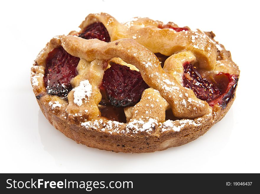 Two cakes with berries on white background. Two cakes with berries on white background