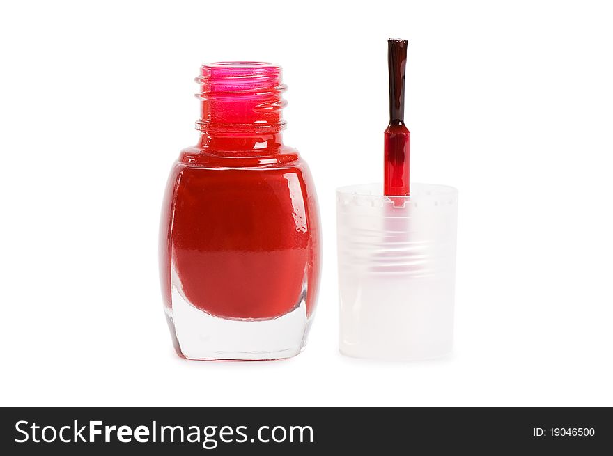 Red nail polish on a white background