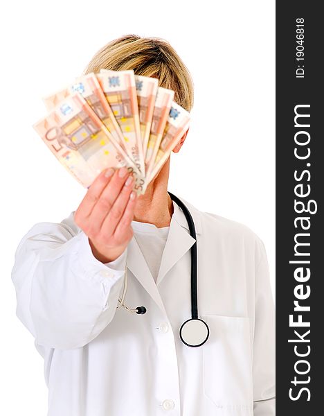 Female doctor holding banknotes