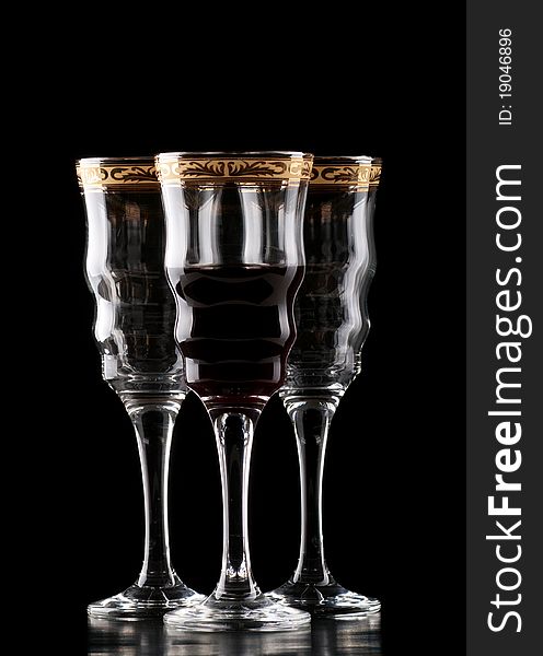 Three wineglass isolated on black