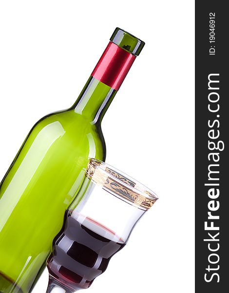 Wine bottle and wineglass on a white background