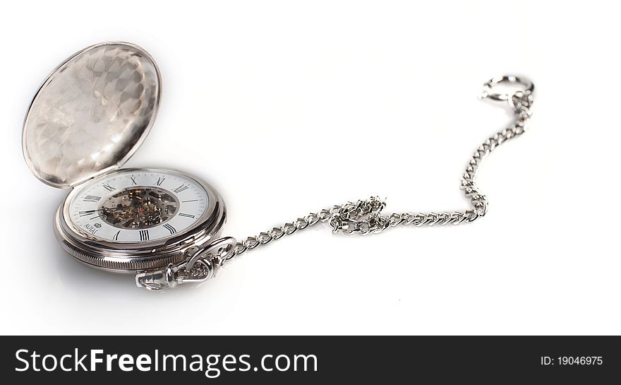 Pocket watch on white table. Pocket watch on white table