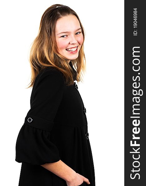 Girl in a black coat over a white background