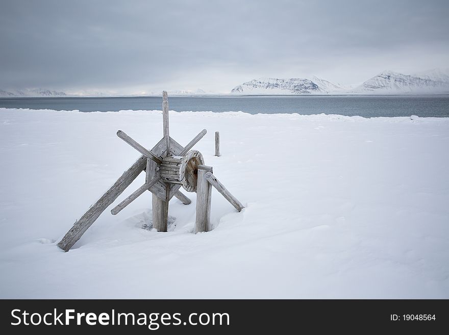 Svalbard - Very Old Wooden Equipment On The Shore