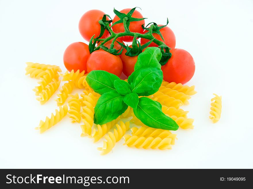 Composition of pasta, tomato and basil. Composition of pasta, tomato and basil